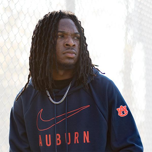 Auburn student wearing navy Nike hoodie